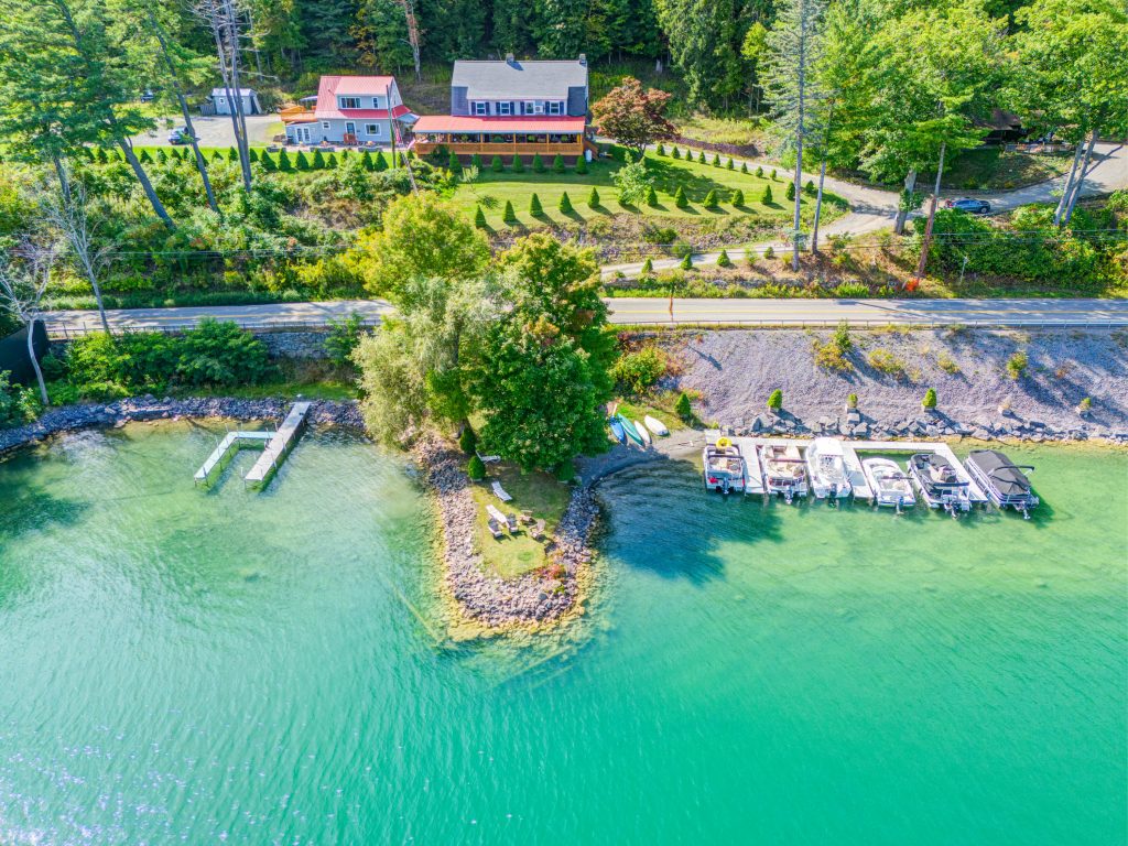 Aerial Drone Real Estate Photograph Taken Above Otsego Lake of Listing in Cooperstown NY Shot by New York Real Estate Photography